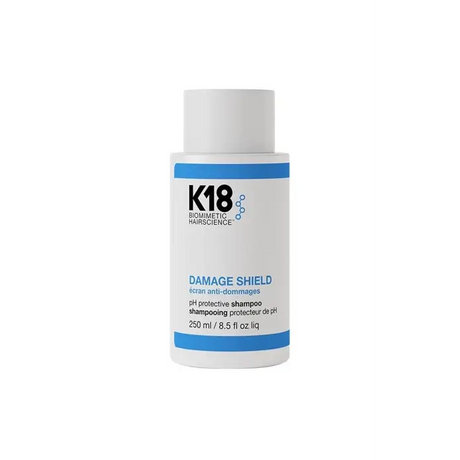 K18 Damage Shield Sampon 250ml – Védő sampon pH optimalizált formulával sérült hajra színvédelemmel és göndörség elleni