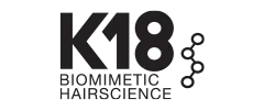 Logo-ul de text negru care spune 'K18 BIOMIMETIC HAIRSCIENCE' cu un simbol al unei lanț moleculare.